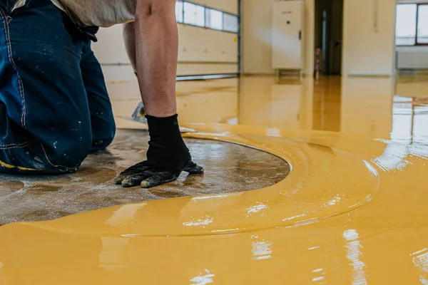 Worker Mixing Yellow Epoxy Resin with the Mixer Stock Image - Image of  floor, resin: 201816033