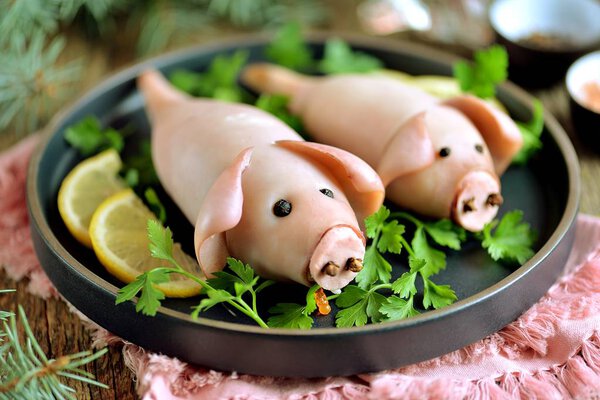 Stuffed squids in the form of cute pigs - a symbol of the year 2019.