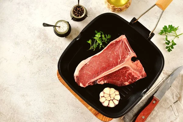 Fresh Raw Organic Beef Bone Steak Light Background Top View — Stock Photo, Image