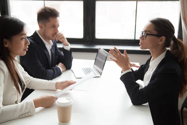 Confident applicant being judged by interviewing HR managers — Stock Photo, Image
