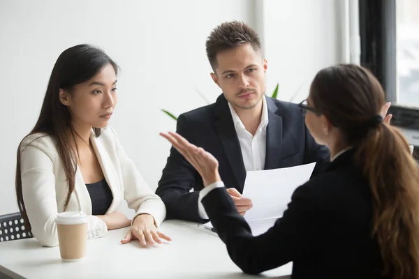 Skeptical diverse hr managers interviewing female applicant, bad — Stock Photo, Image