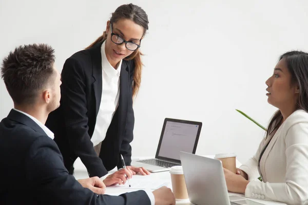 Subordinates scared of angry dissatisfied female boss scolding a — Stock Photo, Image