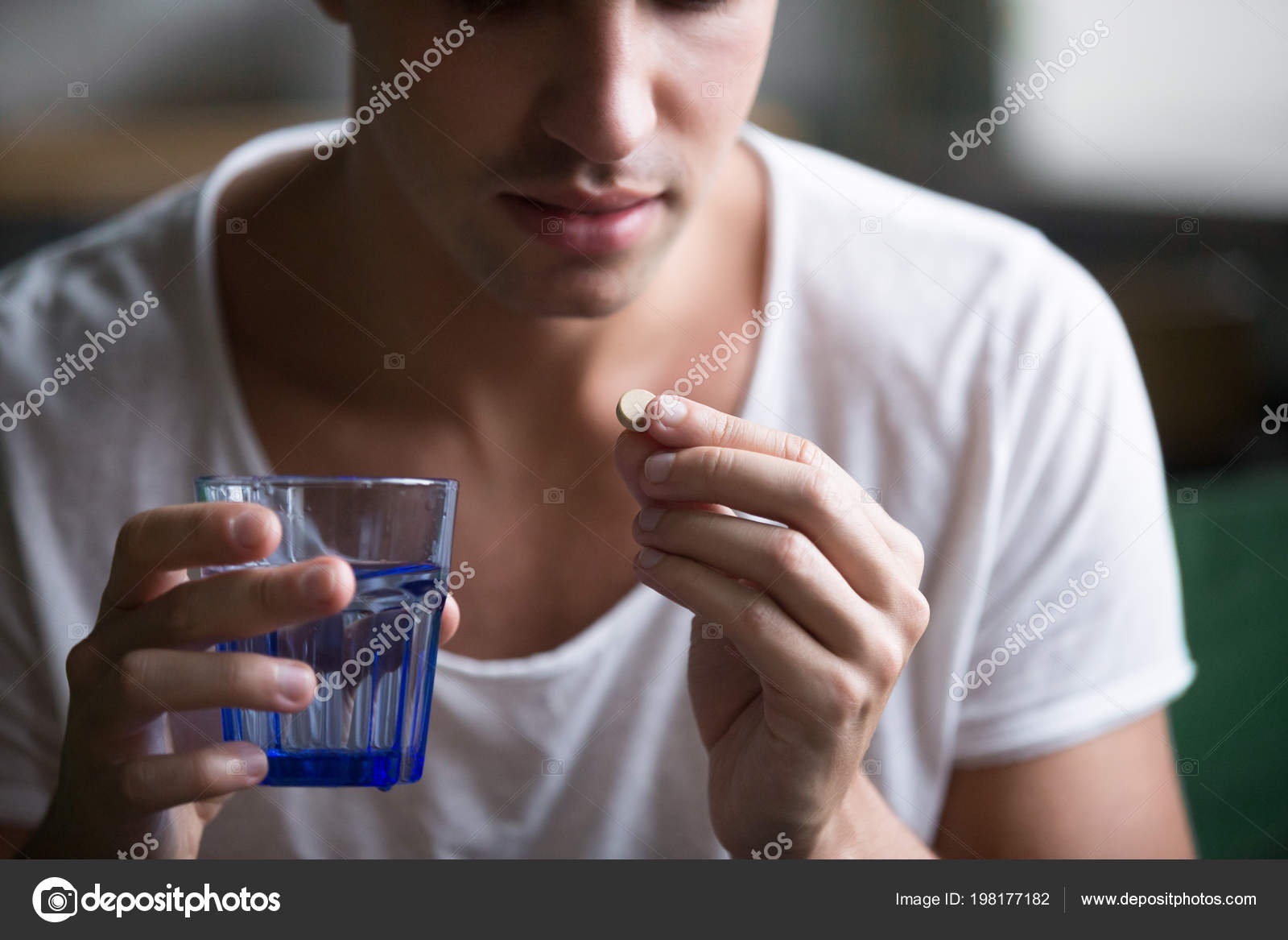 Sick Ill Depressed Man Holding Glof Water Taking Pill Suffering From Headache Fighting Stress With Antidepressant Drugs Meds Painkillers To Relieve Sick Ill Depressed Man Holding Glof Water Taking Pill Suffering From Headache Fighting Stress With Antidepressant Drugs Meds Painkillers To Relieve