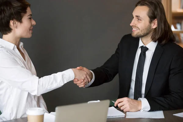 Business partners handshaking after closing successful deal — Stock Photo, Image