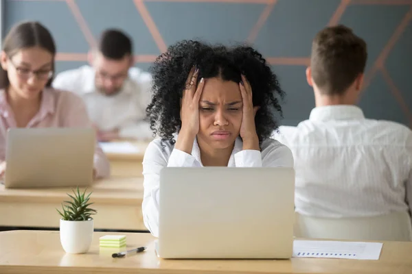 Upset black female feeling down reading bankruptcy news — Stock Photo, Image