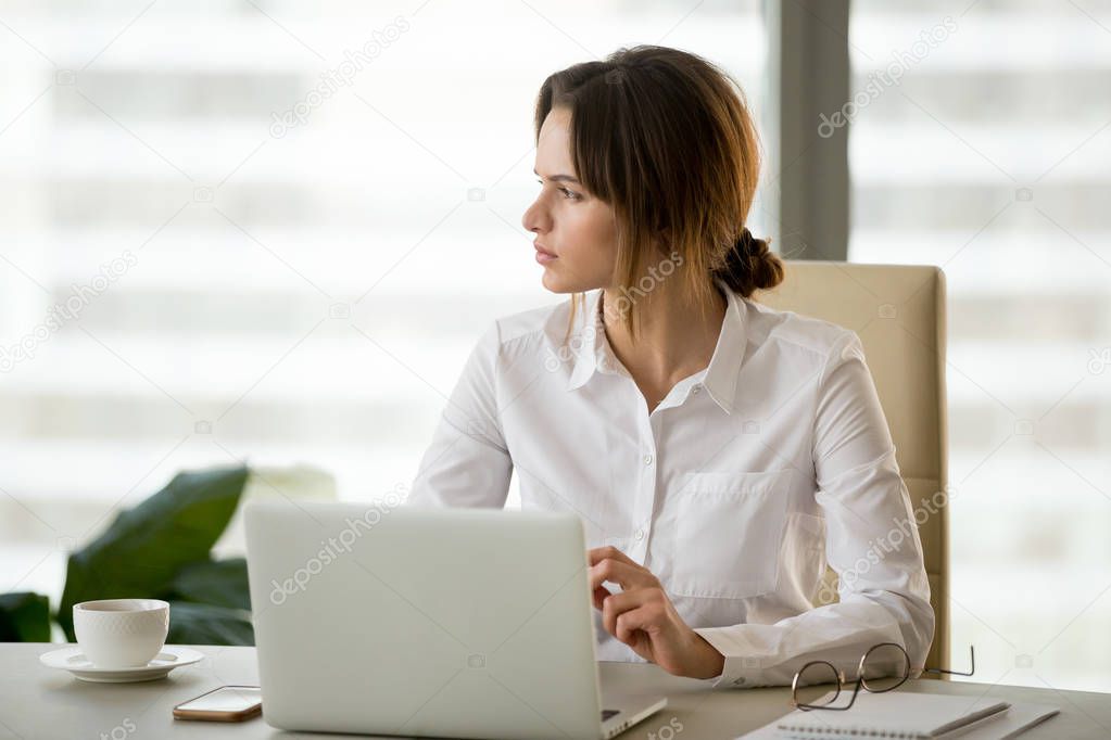 Serious businesswoman thinking about business problem solution 