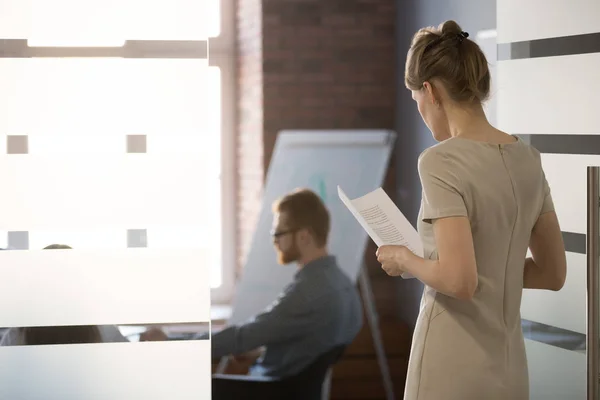 Nervous female employee scared join team meeting in office — Stock Photo, Image