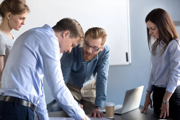 Angry businessman disagree with colleague over document mistake — Stock Photo, Image