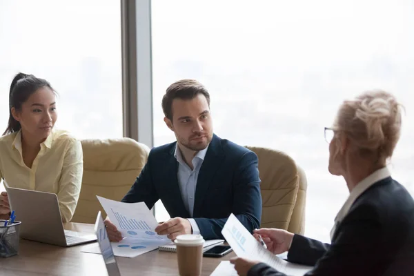 Multiracial partners brainstorming at negotiations meeting in of — Stock Photo, Image