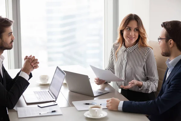 Business partners talk considering contract terms at briefing — Stock Photo, Image