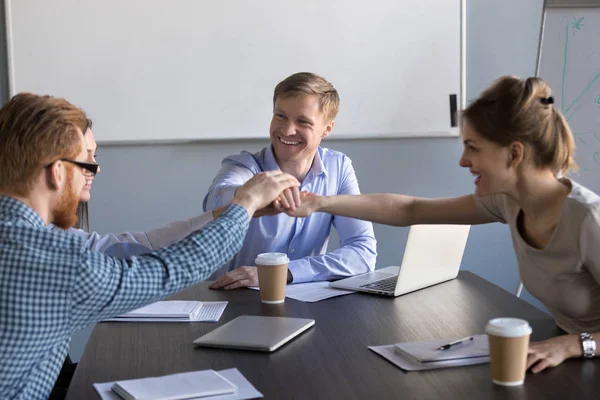 Happy motivated business team people join hands together at meet — Stock Photo, Image