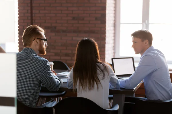 Rear view at business team people talking at office meeting — Stock Photo, Image