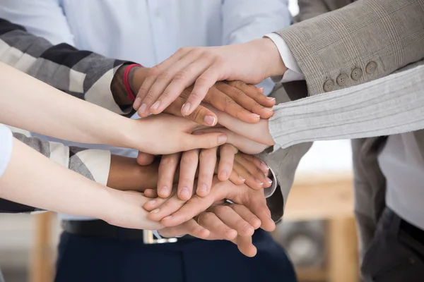 Close up group of people stacking hands — Stock Photo, Image