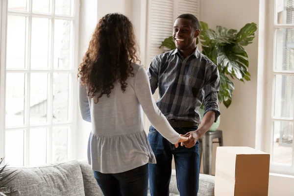 Black couple in love celebrate moving at new home — Stock Photo, Image