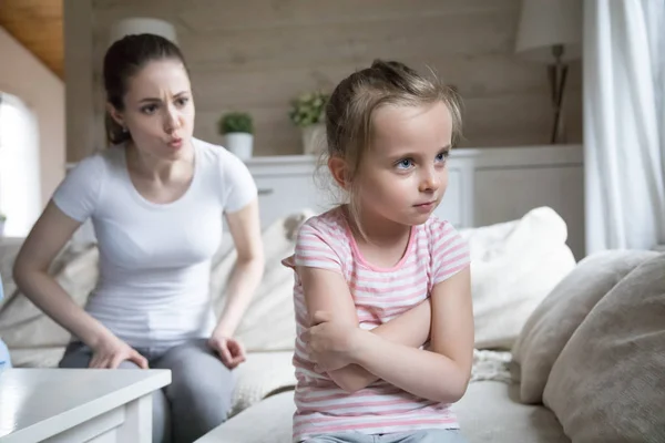 Angry mother scolding little sad preschool daughter — Stock Photo, Image