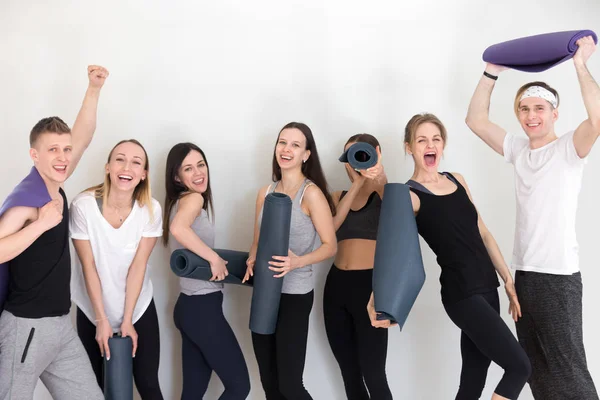 stock image Group of sporty people have fun standing together at gym