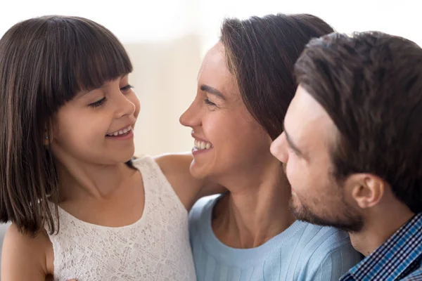 Close up smiling diverse family with small daughter — Stock Photo, Image