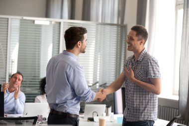 Ceo motivating rewarding male employee shaking hand congratulati clipart
