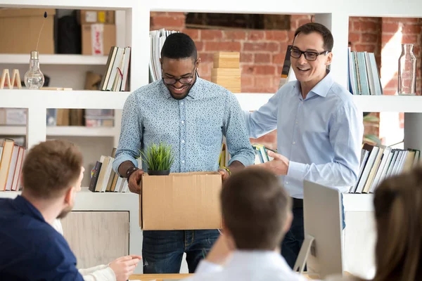Male CEO introduce black newcomer to work team at briefing — Stock Photo, Image