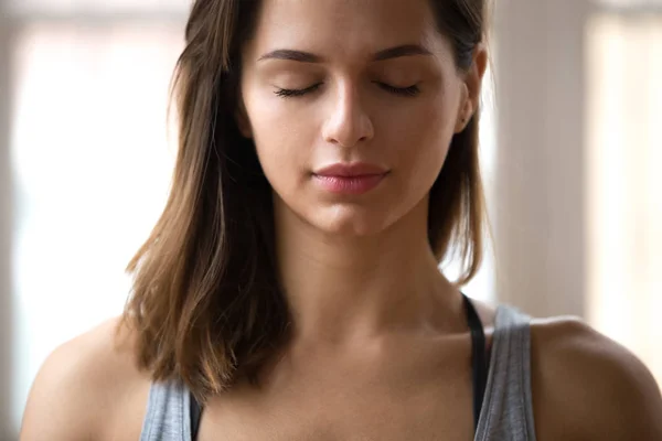 Portrait of attractive yogi woman meditating, close up — Stock Photo, Image