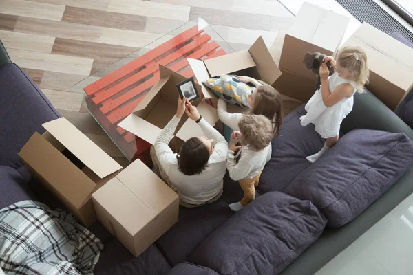 Happy family with children in living room — Stock Photo, Image