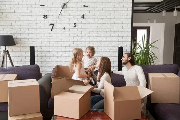 Happy family with children in living room — Stock Photo, Image