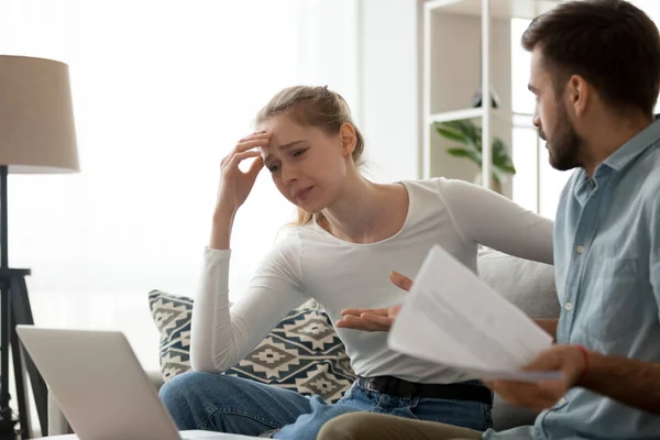 Millennial couple dispute over financial bills at home