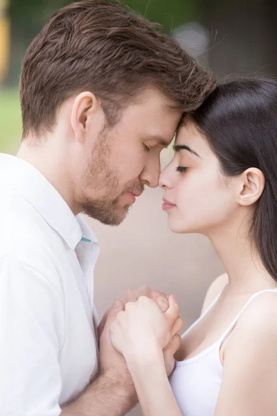 Sensual couple facing with closed eyes touching noses — Stock Photo, Image