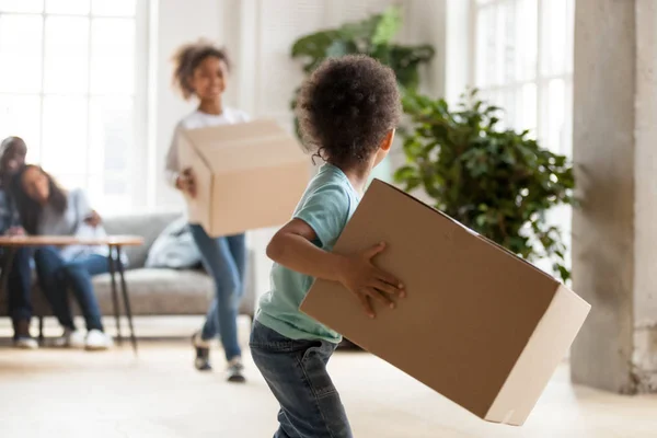 Happy African American family moving in new house — Stock Photo, Image