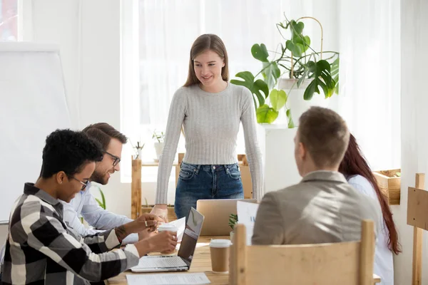 Young female mentor lead casual business meeting