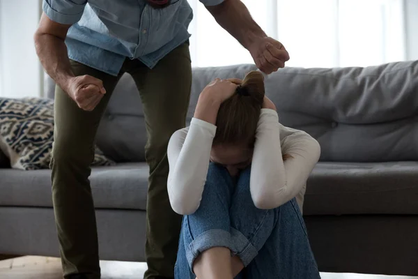Abusive husband threaten crying wife, fear of domestic violence concept — Stock Photo, Image