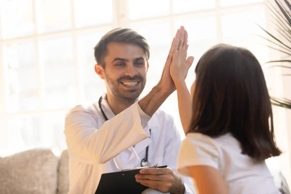 Happy Friendly Male Doctor Pediatrician Holding Clipboard Giving High Five — Stock Photo, Image
