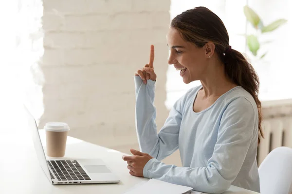 Female looking on computer screen feels happy making right decision — Stock Photo, Image