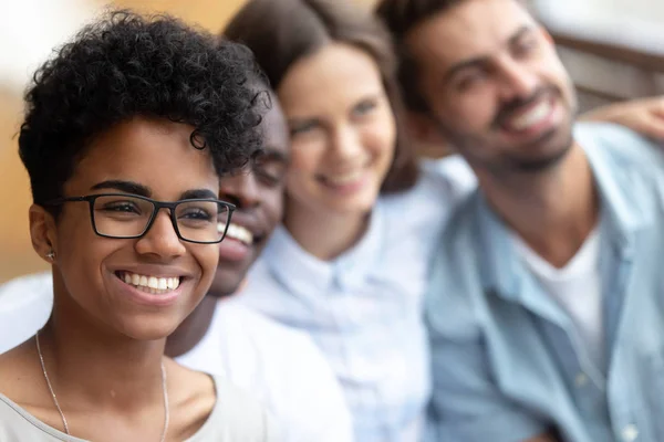 Attractive multiracial people standing together posing smiling for picture — Stock Photo, Image