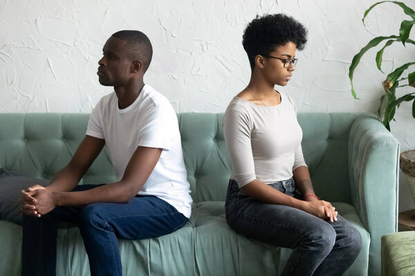 Couple not talking and looking at each other after quarrel