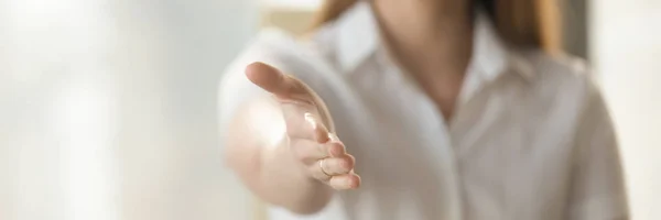 Close up businesswoman holds out her hand for handshake — Stock Photo, Image