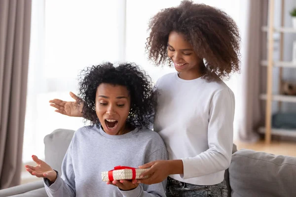 African daughter make surprise to beloved mother — Stock Photo, Image