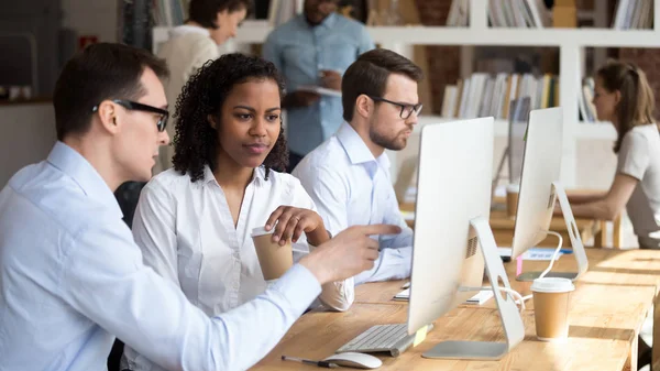 Multiracial people working in coworking office, mentor teach trainee — Stock Photo, Image