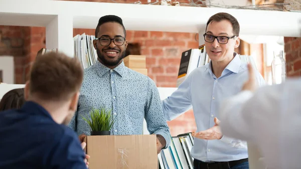 African man having first working day getting acquainted with colleagues — Stock Photo, Image