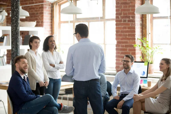 Company executive manager talking with company members during briefing — Stock Photo, Image