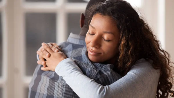 Loving girlfriend hug boyfriend happy to reconcile after fight — Stock Photo, Image