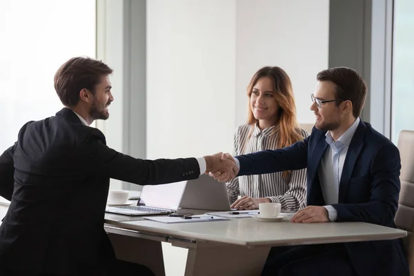 Business partners shaking hands negotiating at office meeting, collaboration concept — Stock Photo, Image