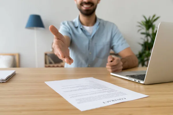 Businessman extending hand for handshake, offer to sign contract — Stock Photo, Image