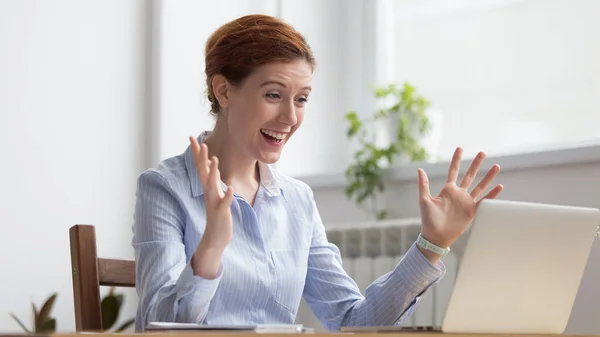 Overjoyed happy businesswoman winner looking at laptop celebrating great result — Stock Photo, Image