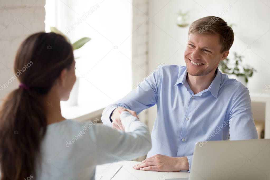 Successful negotiations with a business handshake in the office