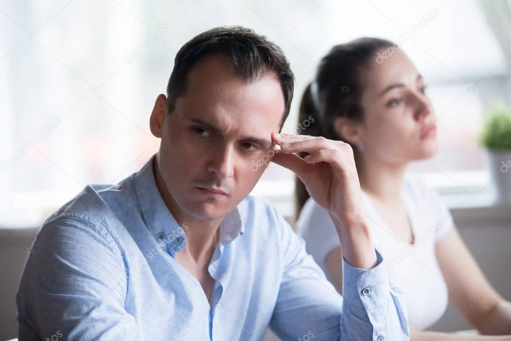 Man and woman stubbornly not talking having fight at home