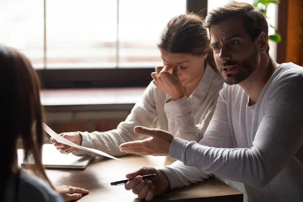 Indignant millennial male accusing incompetent female colleague — Stock Photo, Image