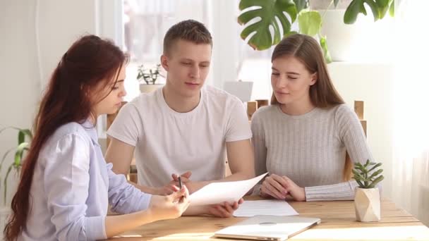 Happy couple renters tenants getting keys making real estate deal — Stock Video