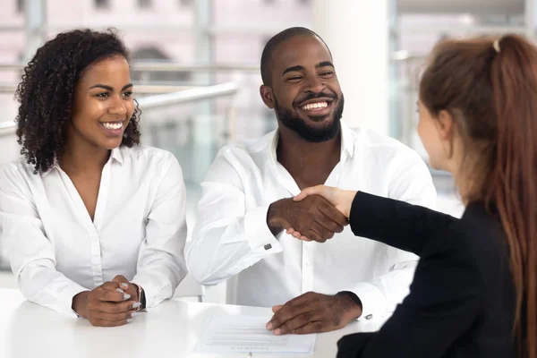 Happy black couple signing mortgage contract get new house keys — Stock Photo, Image