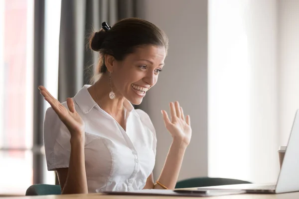 Excited female employee feel euphoric reading good news — Stock Photo, Image